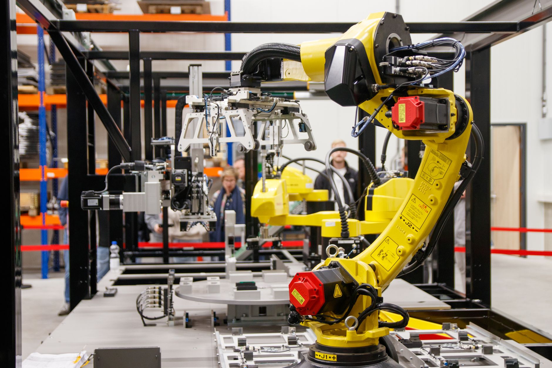 An industrial robotic arm on a modern production line